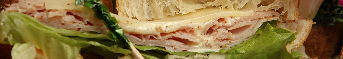 Eating Deli Sandwich at Jarrettsville Creamery and Deli restaurant in Jarrettsville, MD.